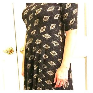 Black with tan casual jersey dress. Nicole.